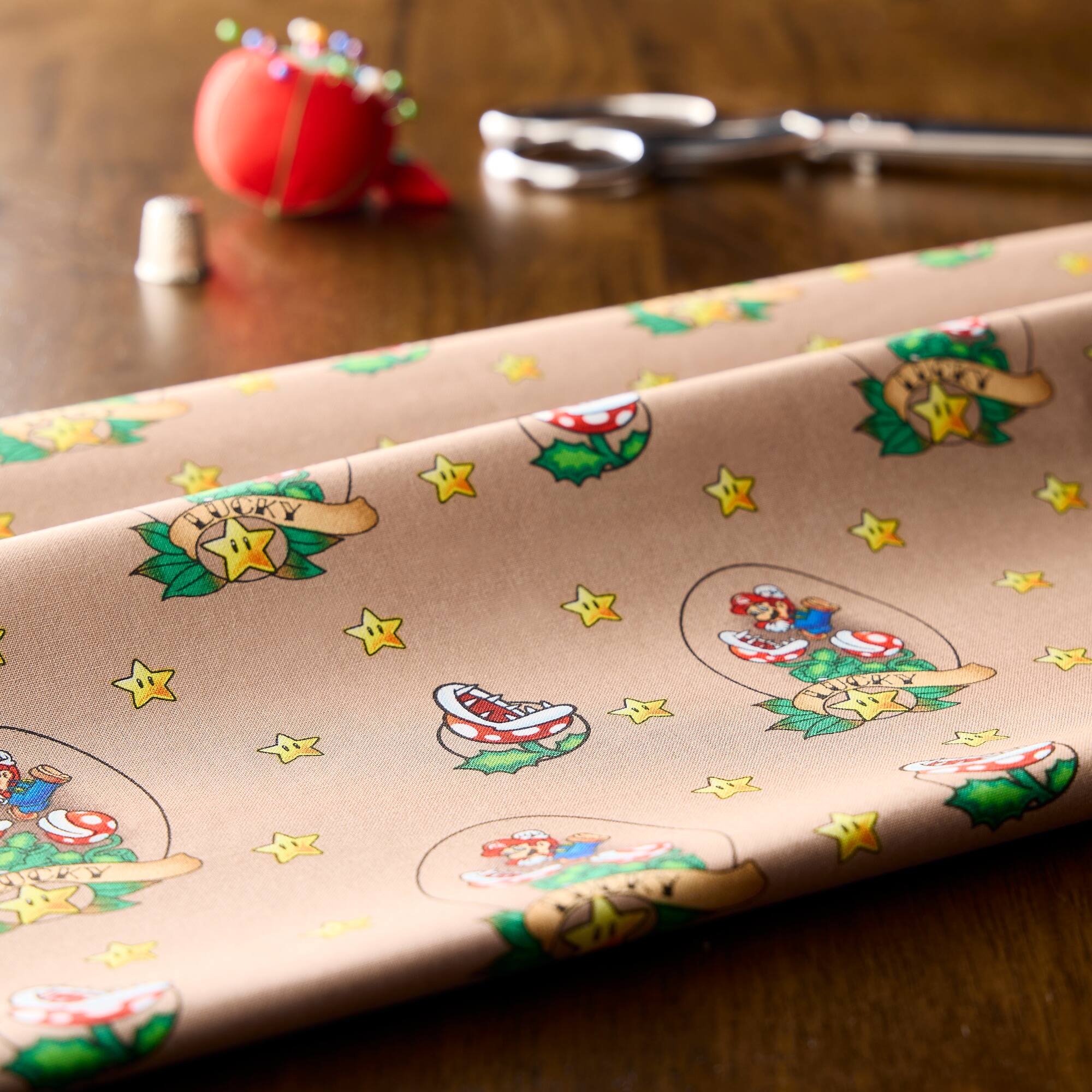 Nintendo® Brown Lucky Mario Cotton Fabric